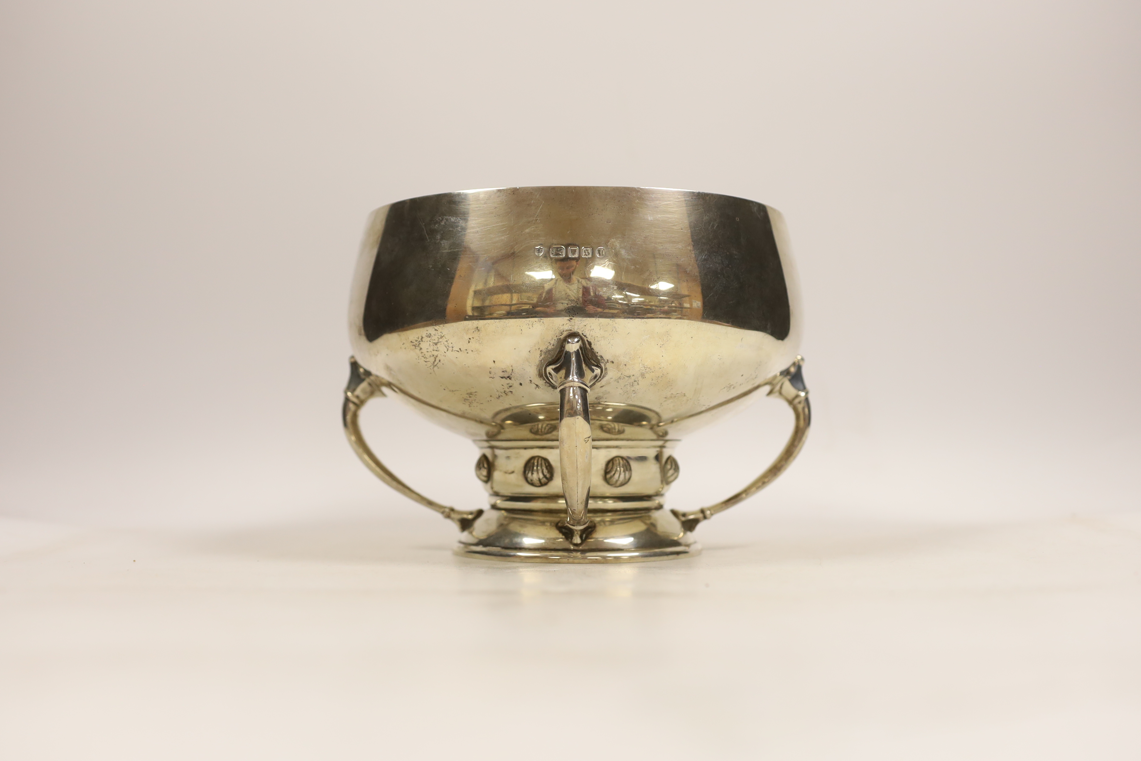 A stylish George V Arts & Crafts silver pedestal bowl, by Edward Barnard & Sons Ltd, London, 1933, diameter 18.4cm, 29.7oz